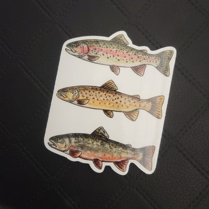 Vinyl die cut sticker by InkBird Print Studio with three vibrant, patterned fish; vertical design, strong adhesive, custom contour cut. Printed for Good Days Marina