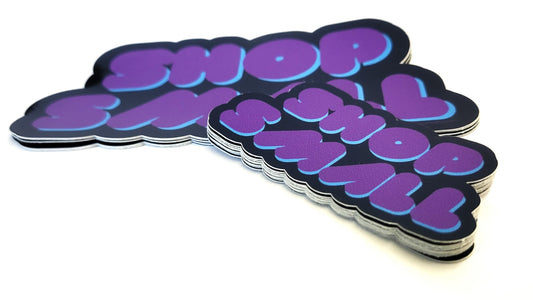 Vinyl Shop Small decals by InkBird Print Studio in bold blue and purple bubble letters on black, weatherproof for outdoor use.