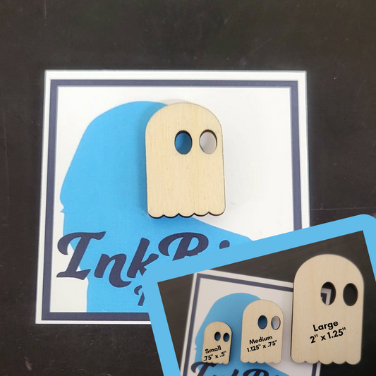 Simple Ghost Pin by InkBird Print Studio, birch wood, white finish, two eye holes, three size options shown on display card.