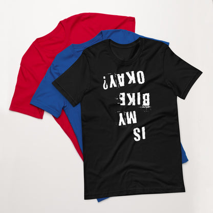 InkBird Print Studio “Is My Bike Okay?” cotton T-shirt, white distressed vinyl text, gray color, S-XL; stacked atop red and blue tees.